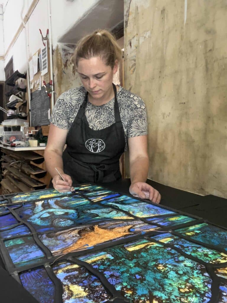 Glazier for windows by stained glass artist Tom Denny